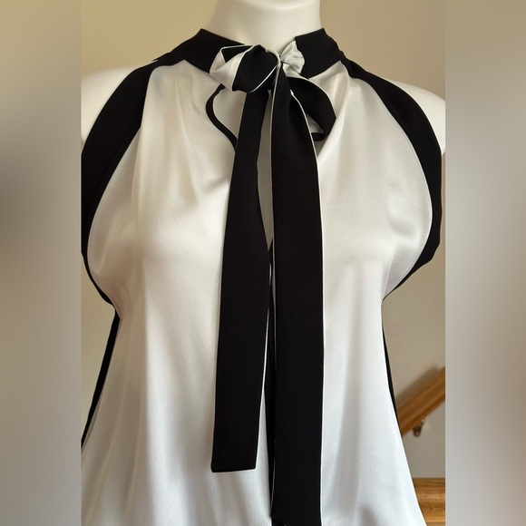 Lauren Vidal Satin White & Black Sleeveless Blouse.Ties In Front Elastic Bottom. - Picture 3 of 13